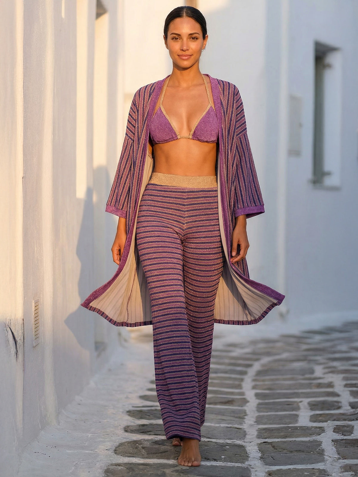 Club 55 Beach Outfit – 4 Pieces Beach Set Women Standing in the street.