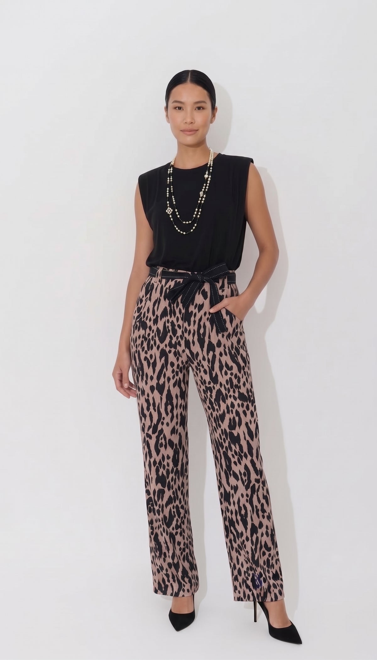 Leopard print wide-leg viscose trousers by Poupee Bonbon with a flowing resort-style silhouette